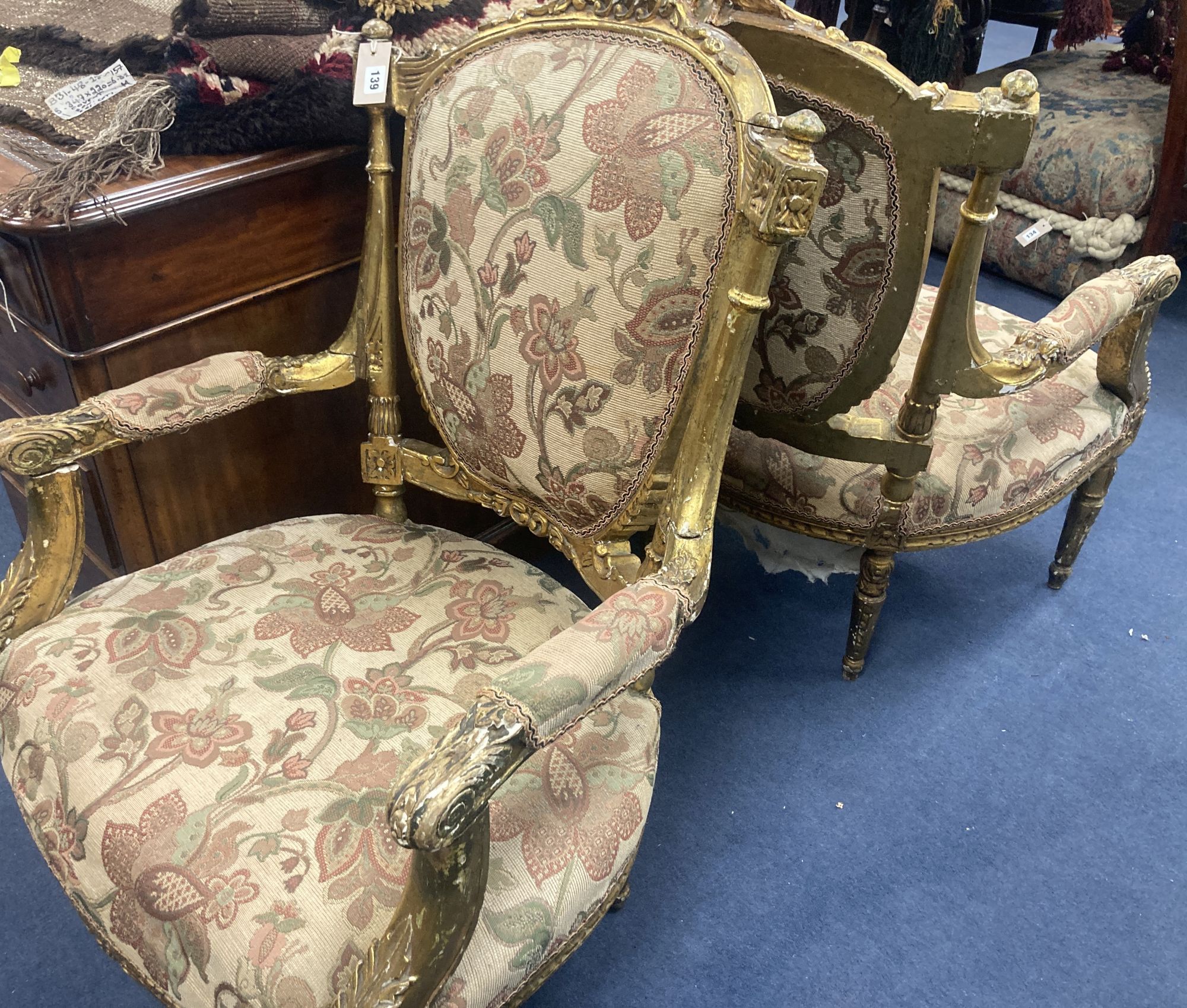 A pair of Louis XVI design giltwood and gesso open armchairs, width 66cm, depth 60cm, height 96cm